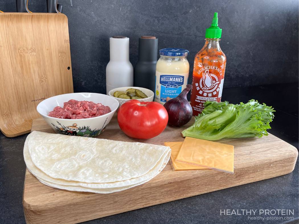 Cheeseburger wrap tortilla recipe ingredients ground beef cheese tomato lettuce red onion pickles